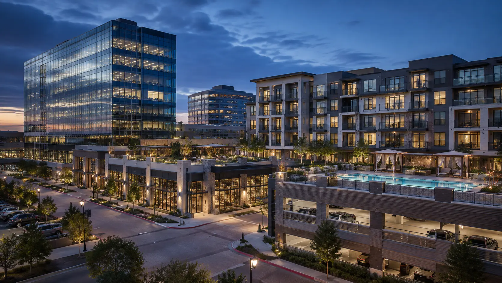 Generic commercial property portfolio with office buildings illuminated at blue hour.
